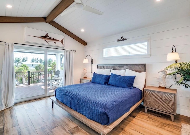 bedroom with hardwood / wood-style floors, access to outside, ceiling fan, and lofted ceiling with beams