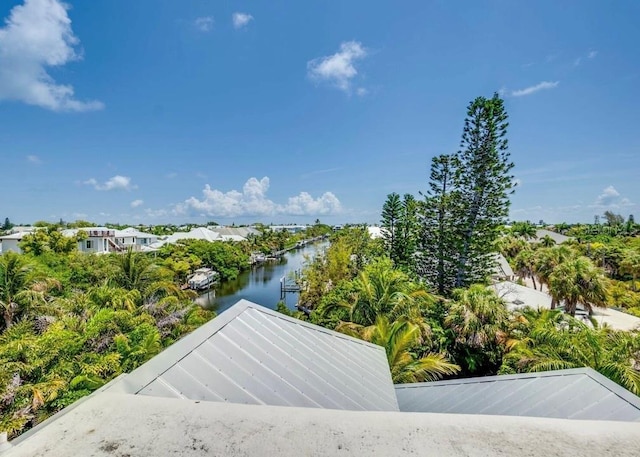 exterior space with a water view