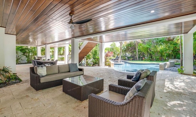 view of patio with outdoor lounge area and ceiling fan