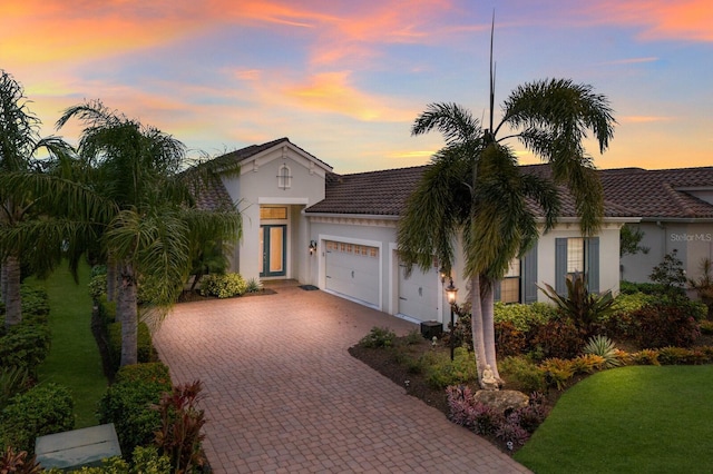 view of front of property featuring a garage