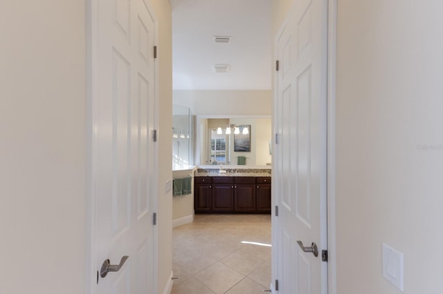full bath featuring visible vents, tile patterned floors, and vanity