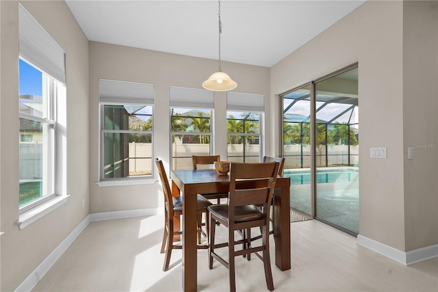 dining space featuring a healthy amount of sunlight