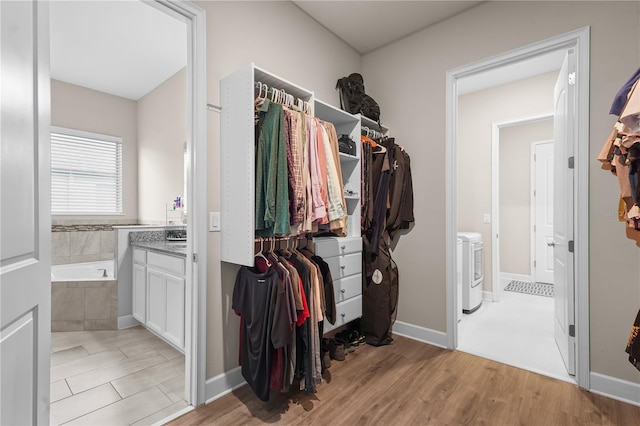 spacious closet with light wood-type flooring