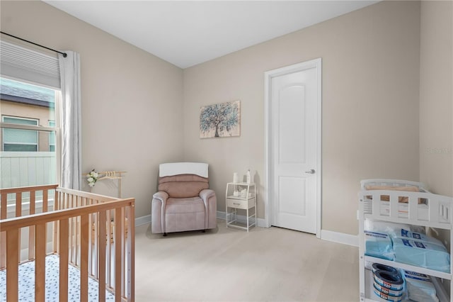 bedroom with a nursery area