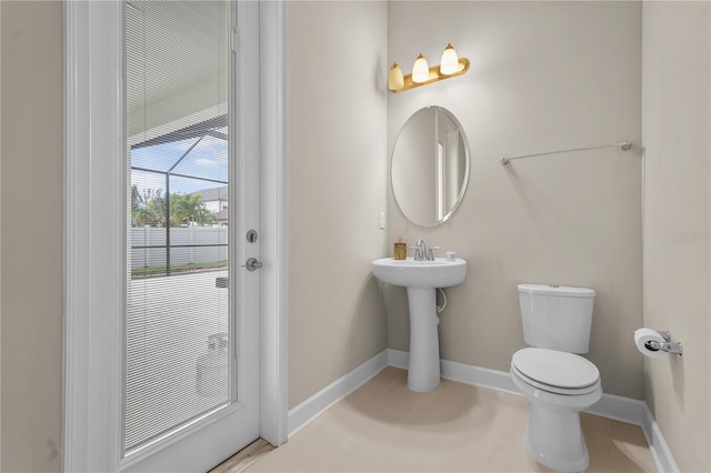 bathroom featuring toilet