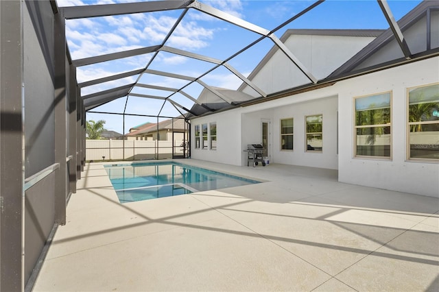 view of pool featuring a grill, a lanai, and a patio