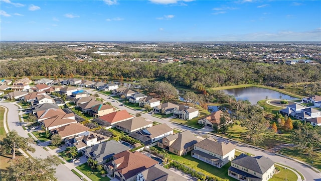 drone / aerial view with a water view