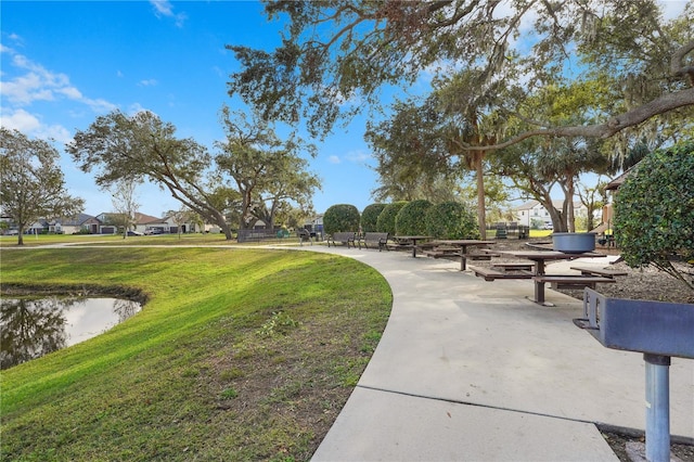 surrounding community featuring a lawn