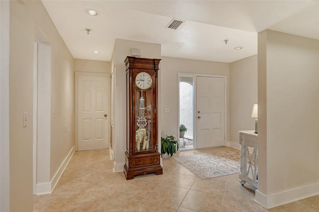 entryway featuring light tile patterned floors