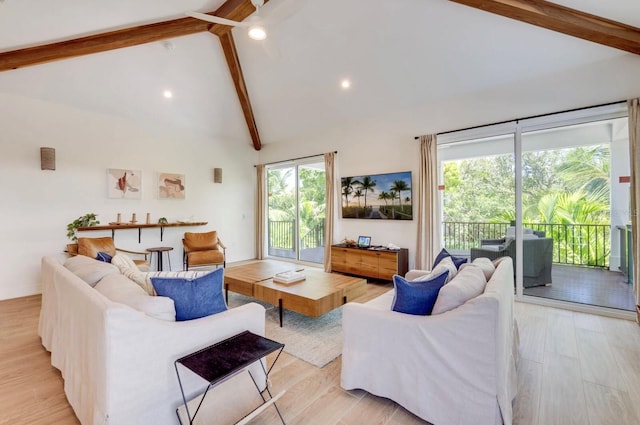 living room featuring high vaulted ceiling, beamed ceiling, and light wood-type flooring