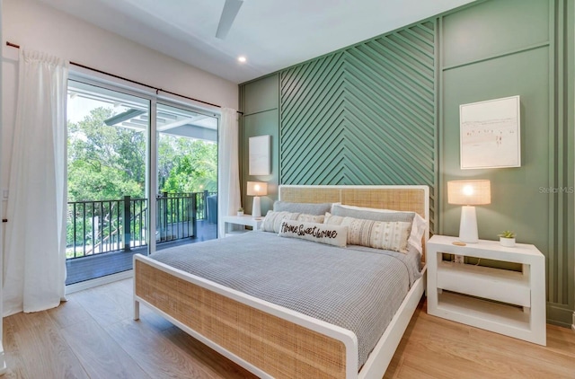 bedroom featuring ceiling fan, access to exterior, and light hardwood / wood-style floors