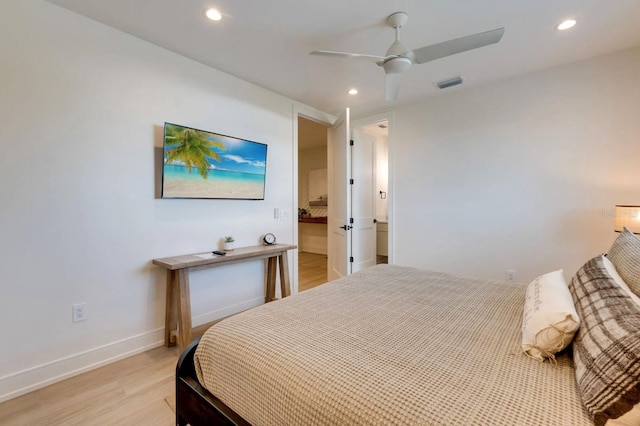 bedroom with ceiling fan and light wood-type flooring