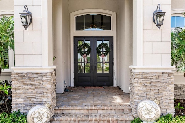 doorway to property featuring french doors