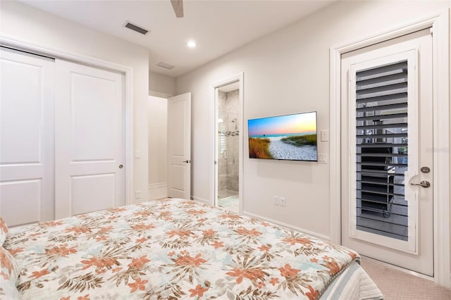 carpeted bedroom with ceiling fan, connected bathroom, and a closet