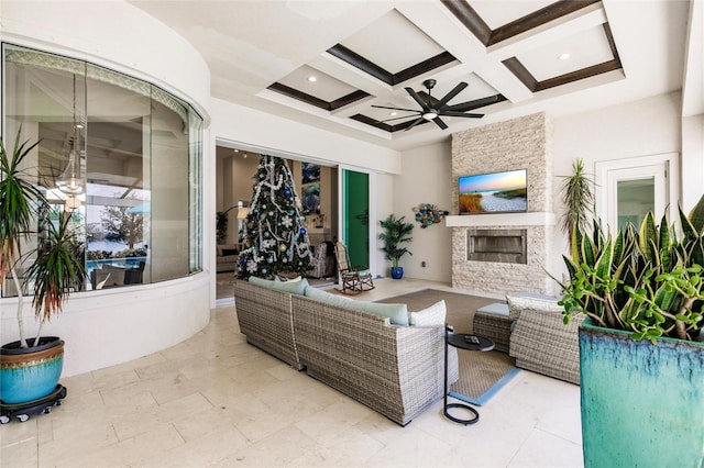 view of patio with an outdoor living space and ceiling fan