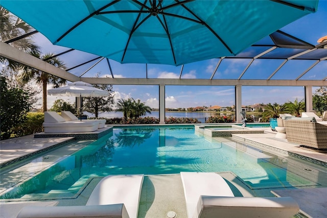 view of swimming pool with an in ground hot tub and glass enclosure