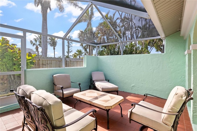 view of patio / terrace with outdoor lounge area and glass enclosure