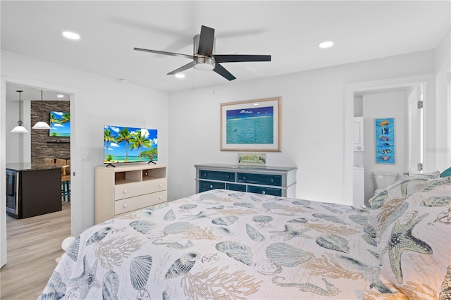 bedroom featuring light hardwood / wood-style flooring and ceiling fan