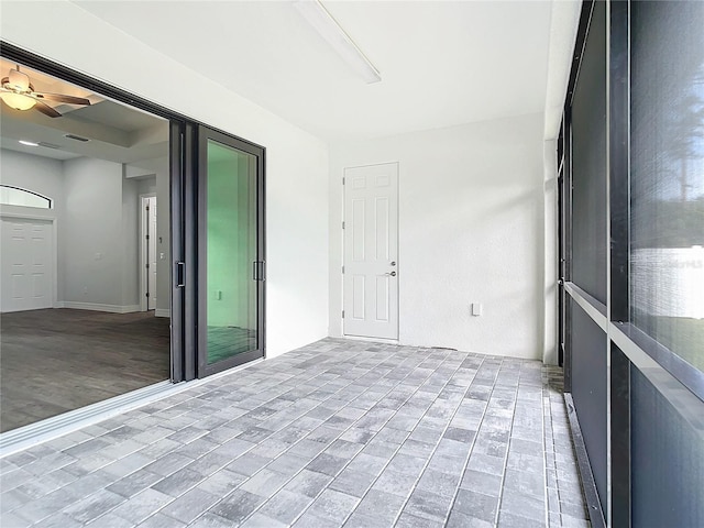 unfurnished room with ceiling fan and light hardwood / wood-style floors