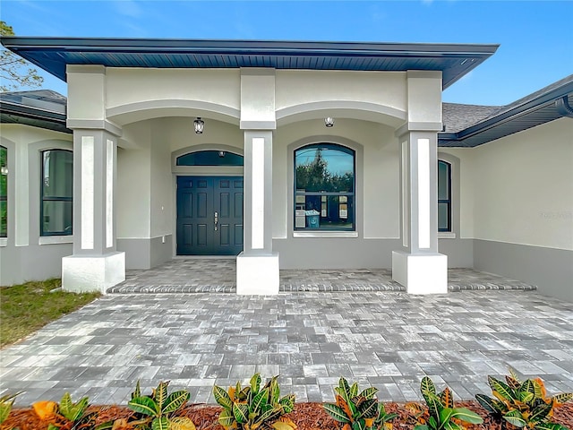 entrance to property with a porch