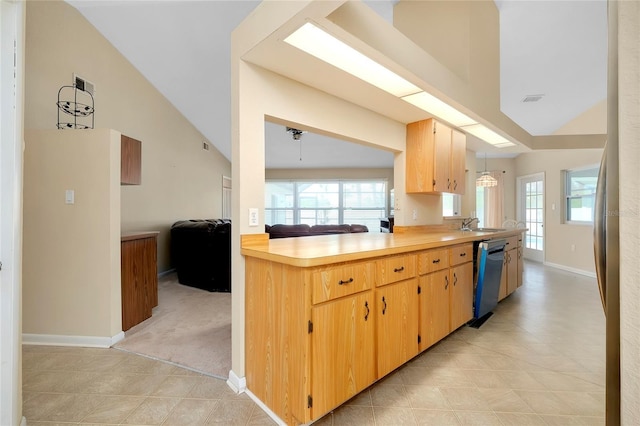 kitchen with kitchen peninsula, light carpet, sink, pendant lighting, and black dishwasher