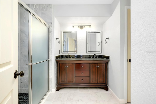 bathroom with vanity and walk in shower