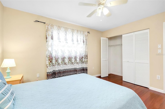 bedroom featuring dark hardwood / wood-style flooring and ceiling fan