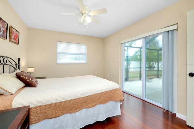 bedroom with ceiling fan, dark hardwood / wood-style flooring, and access to outside