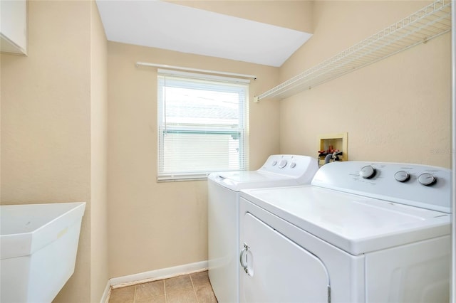 washroom featuring washer and dryer