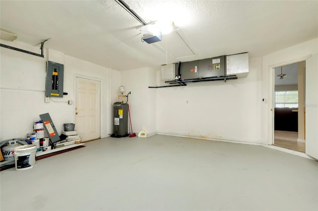 garage with a garage door opener, electric panel, and water heater