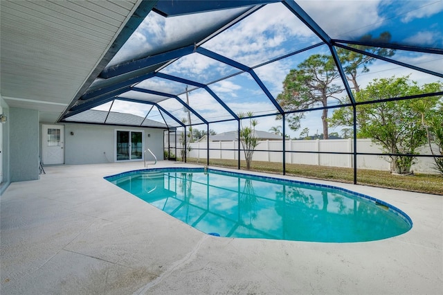 view of pool featuring a patio area and a lanai