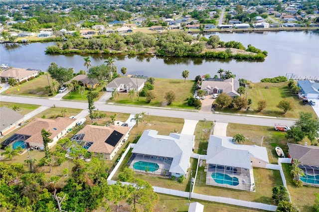 bird's eye view with a water view