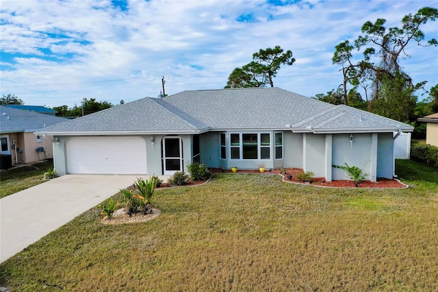 ranch-style home with a garage and a front lawn