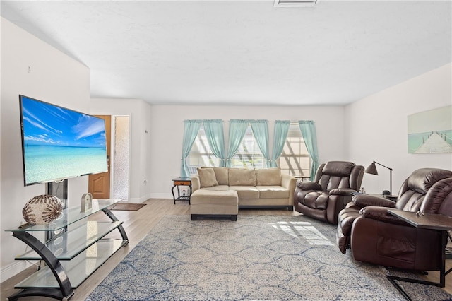 living room with light wood-type flooring