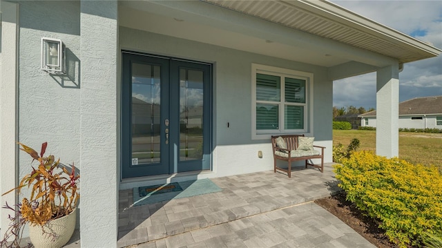 doorway to property with a porch