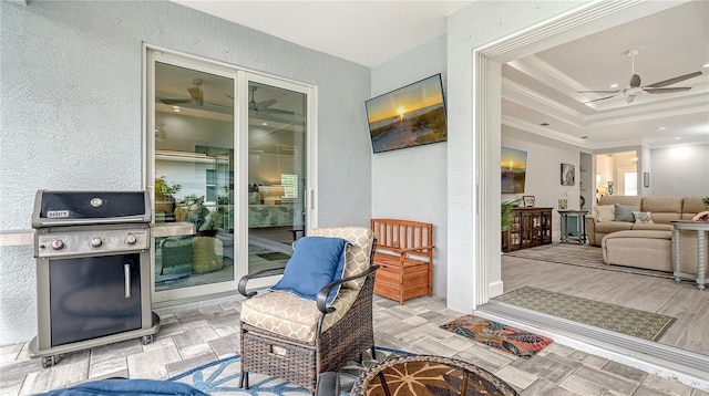 view of patio / terrace featuring ceiling fan and a grill