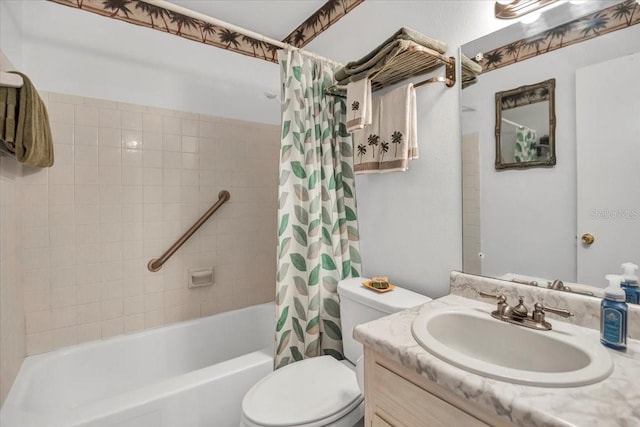 full bathroom featuring shower / bath combo, vanity, and toilet