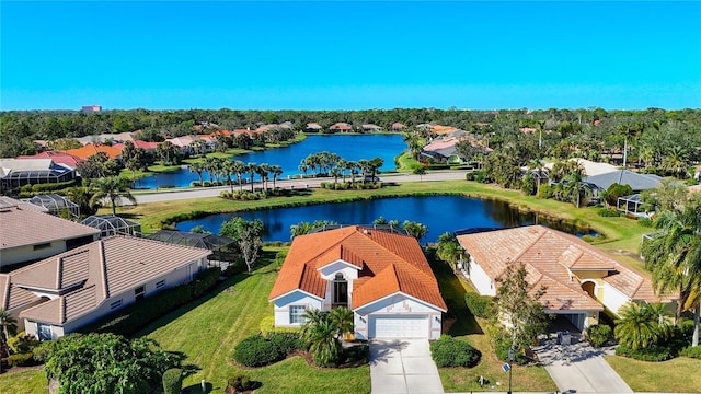 bird's eye view with a water view