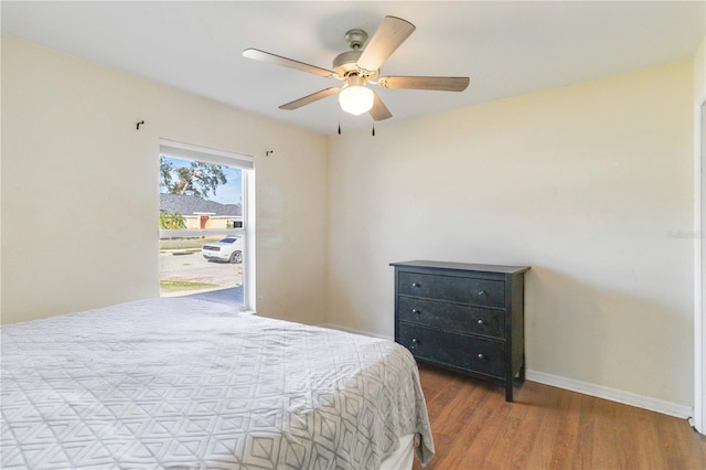 bedroom featuring ceiling fan and wood-type flooring