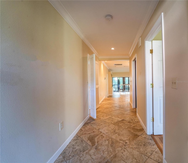 hallway featuring crown molding