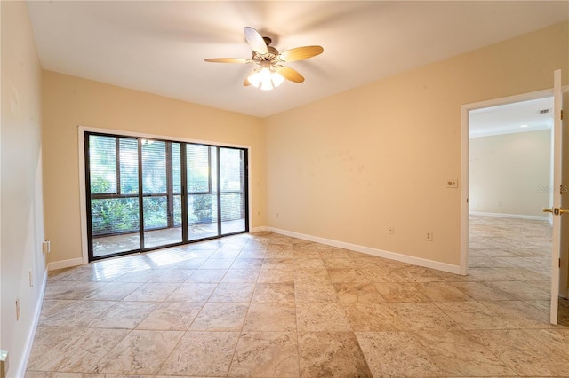 spare room featuring ceiling fan