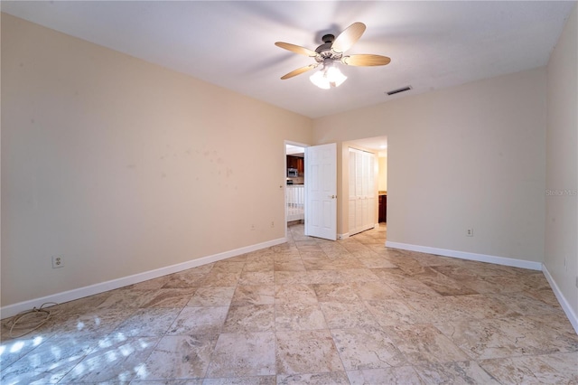 unfurnished room featuring ceiling fan