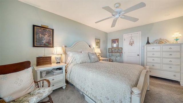 carpeted bedroom featuring ceiling fan