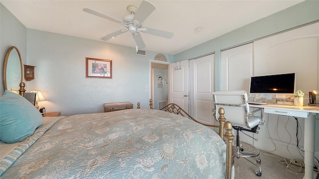 bedroom featuring multiple closets and ceiling fan