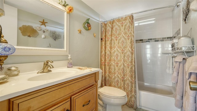 full bathroom featuring shower / bathtub combination with curtain, vanity, and toilet