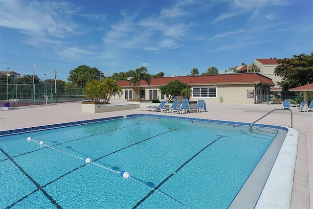 view of pool featuring a patio area