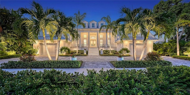 view of front of home featuring french doors and a garage