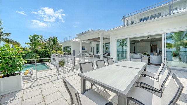 view of patio featuring ceiling fan