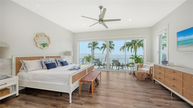 bedroom featuring ceiling fan, dark hardwood / wood-style floors, and access to outside