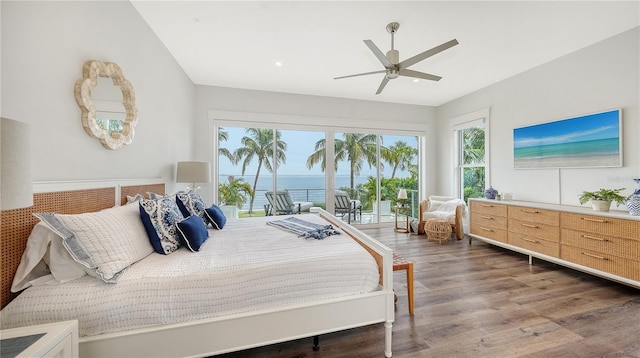 bedroom featuring access to outside, ceiling fan, and dark wood-type flooring